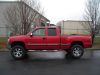 Red1500ChevyLifted_01~0.JPG